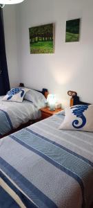 Postel nebo postele na pokoji v ubytování CENTRO-PRIMERA LINEA DE PLAYA