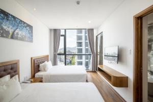 Hai Trieu Hotel客房内的一张或多张床位