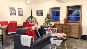 Posedenie v ubytovaní Apartamenty Dwupoziomowe Na Dwa Widoki z Jacuzzi & Sauna