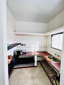 Kuchyň nebo kuchyňský kout v ubytování Lumina Home Stay