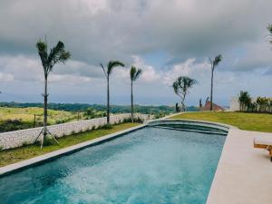 Bazén v ubytování Sundance Residence Nusa Penida nebo v jeho okolí