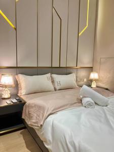 Ένα ή περισσότερα κρεβάτια σε δωμάτιο στο Hill10 Residence, i-city Shah Alam (Golden Shacks)