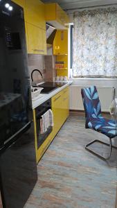 Η κουζίνα ή μικρή κουζίνα στο Safta Apartaments +22 φωτογραφίες