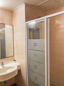 a bathroom with a sink and a shower at Hotel Terramar in Boryeong +29 photos