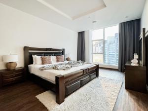Postel nebo postele na pokoji v ubytování Trophy - Private Beachside Bliss Suite