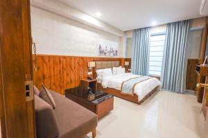 Postel nebo postele na pokoji v ubytování Clay Inn Hotel, Sohna Road, Sector 49, Gurugram