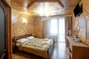 Letto o letti in una camera di Sadyba u Halyny