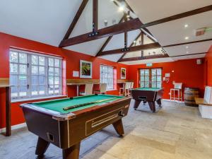 a large room with a pool table in it at 2 Bed in Dunwich 85185 in Westleton