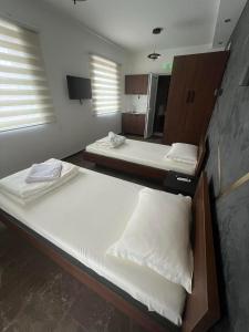Voodi või voodid majutusasutuse Nego apartmani toas