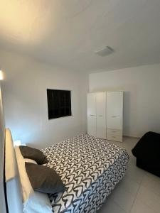 Ένα ή περισσότερα κρεβάτια σε δωμάτιο στο Apartamento Los Silos Azul