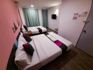 Postel nebo postele na pokoji v ubytování Good2Stay Hostel