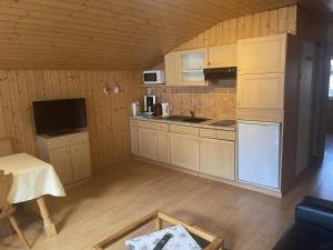 Köök või kööginurk majutusasutuses Chalet Hotel Adler