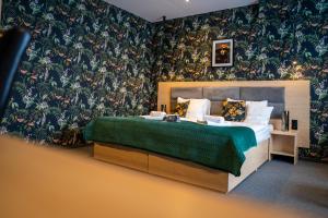 Postel nebo postele na pokoji v ubytování Seven Hotel Bytom - Katowice