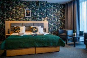 Postel nebo postele na pokoji v ubytování Seven Hotel Bytom - Katowice