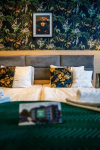 Postel nebo postele na pokoji v ubytování Seven Hotel Bytom - Katowice