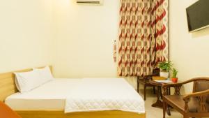 Postel nebo postele na pokoji v ubytování 158A Hotel