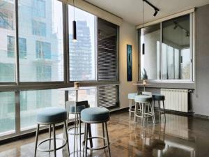 The lounge or bar area at Chic Contemporary 3BR in Mar Mikhael