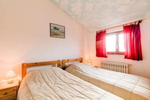 Postel nebo postele na pokoji v ubytování House ROMY