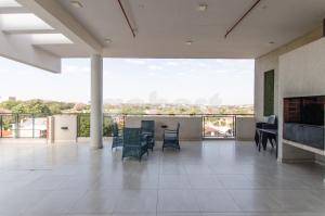 A seating area at Unbeatable Studio W Pool, Wifi In Villa Morra