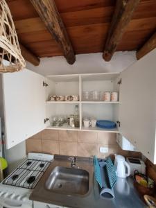 a kitchen with a sink and a stove at Pindó III in Concordia