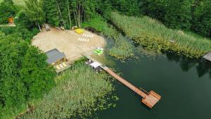 an aerial view of a barge in the water at Hotel Głęboczek Vine Resort& Spa in Wielki Głęboczek