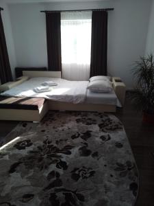 מיטה או מיטות בחדר ב-Casa Sofi