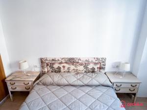 Postel nebo postele na pokoji v ubytování El Oasis