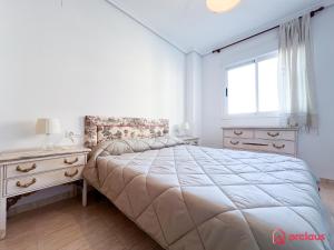 Postel nebo postele na pokoji v ubytování El Oasis