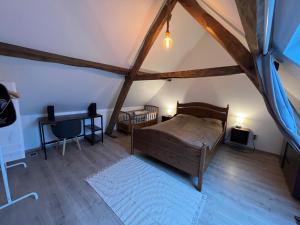 Postel nebo postele na pokoji v ubytování Gîte Rubis - JACUZZI - Pairi Daiza - 6 pers