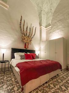 Postel nebo postele na pokoji v ubytování Palazzo Saetta + 22 fotografií