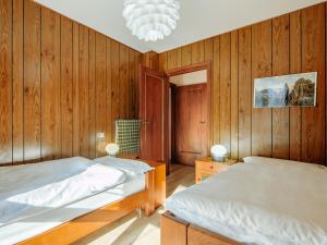 Posteľ alebo postele v izbe v ubytovaní Apartment Condominio al Parco-9 by Interhome