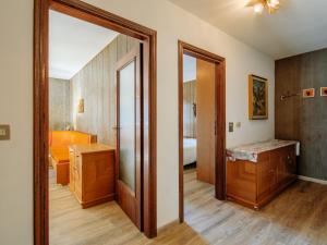 Posteľ alebo postele v izbe v ubytovaní Apartment Condominio al Parco-9 by Interhome