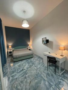 Posteľ alebo postele v izbe v ubytovaní Dante Rooms