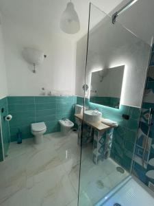 Kúpeľňa v ubytovaní Dante Rooms