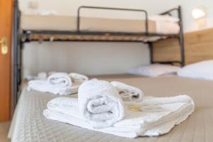 Postel nebo postele na pokoji v ubytování Hotel Luana