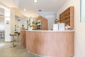 Nápoje v ubytování Hotel Luana
