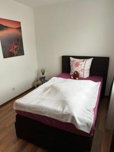 Кровать или кровати в номере Direkt in Zentrum von Wattens