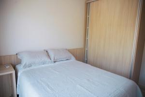 Cama o camas de una habitación en Incrivel casa c otima localizacao em Foz do Iguacu