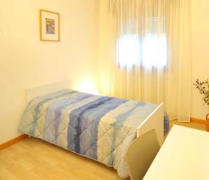 A bed or beds in a room at Bed and Breakfast La Sosta