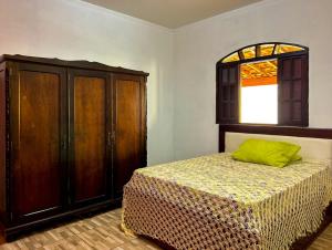 מיטה או מיטות בחדר ב-Chacara com lazer e conforto em Joanopolis SP