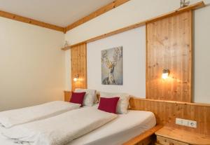 Postel nebo postele na pokoji v ubytování Winklhütte