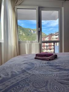 Ένα ή περισσότερα κρεβάτια σε δωμάτιο στο Cozy apartment with the view