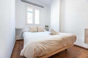 Posteľ alebo postele v izbe v ubytovaní Holidays, Arttyco 2 dormitorios 4 personas