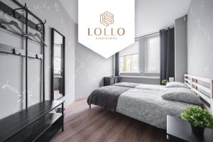 Postel nebo postele na pokoji v ubytování Lollo Motel Graičiūno - Lollo Luxury
