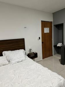 Postel nebo postele na pokoji v ubytování Apartamentos 31