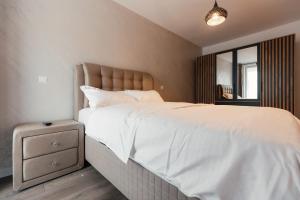 Ліжко або ліжка в номері VIVO Residence Short Stay