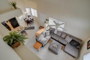 an overhead view of a living room with a couch and chairs at Mesquite Condo with Pool and Spa Access, Near Casinos! in Mesquite
