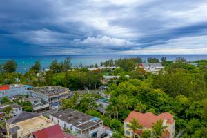 an aerial view of a city with the ocean at A&B Villa in Grand Baie