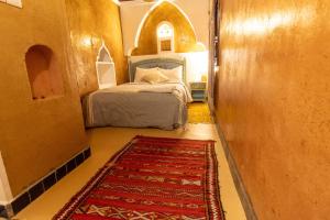 Kasbah Assafar客房内的一张或多张床位