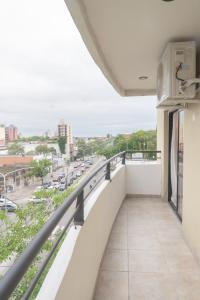 a balcony with a view of a city street at Torre Alem 4 A in San Miguel de Tucumán